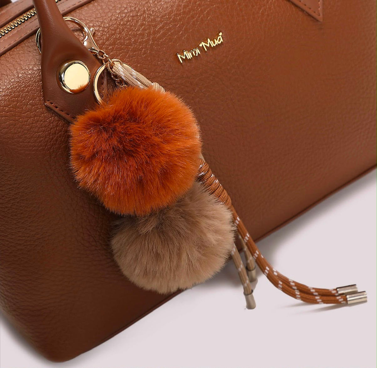 BORSA A BAULETTO CON DETTAGLIO APPESO- MIMI’ MUA’